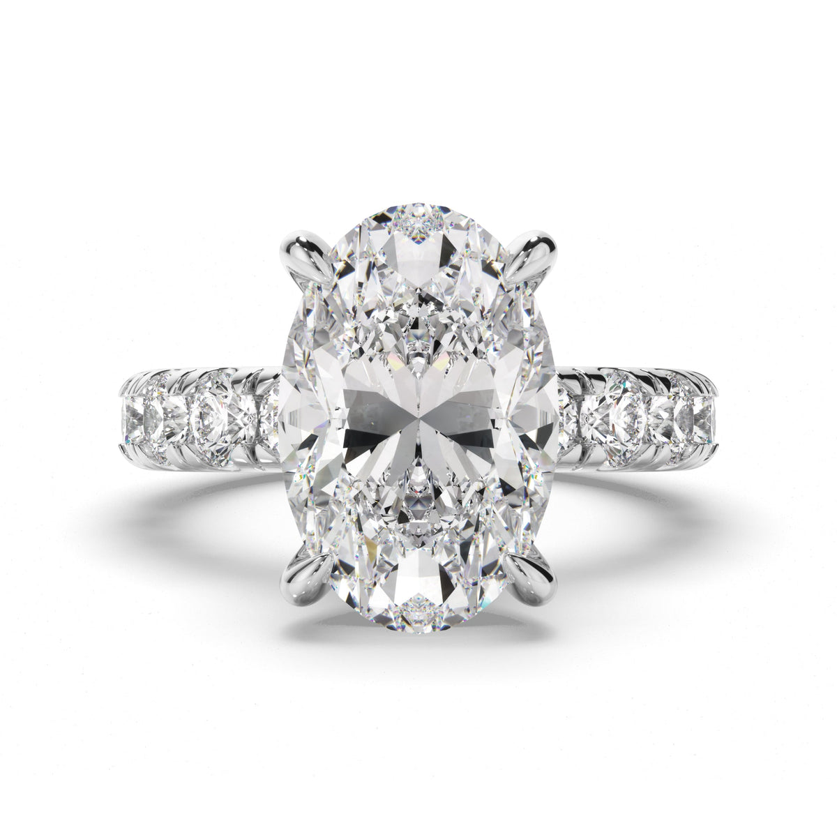 Oval Cut Diamond Engagement Ring with Diamond Sides
