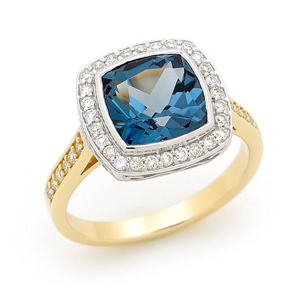 London blue topaz & diamond halo ring